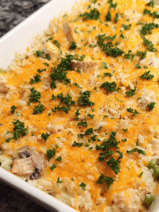 Creamy baked chicken and rice casserole with cheddar topping
