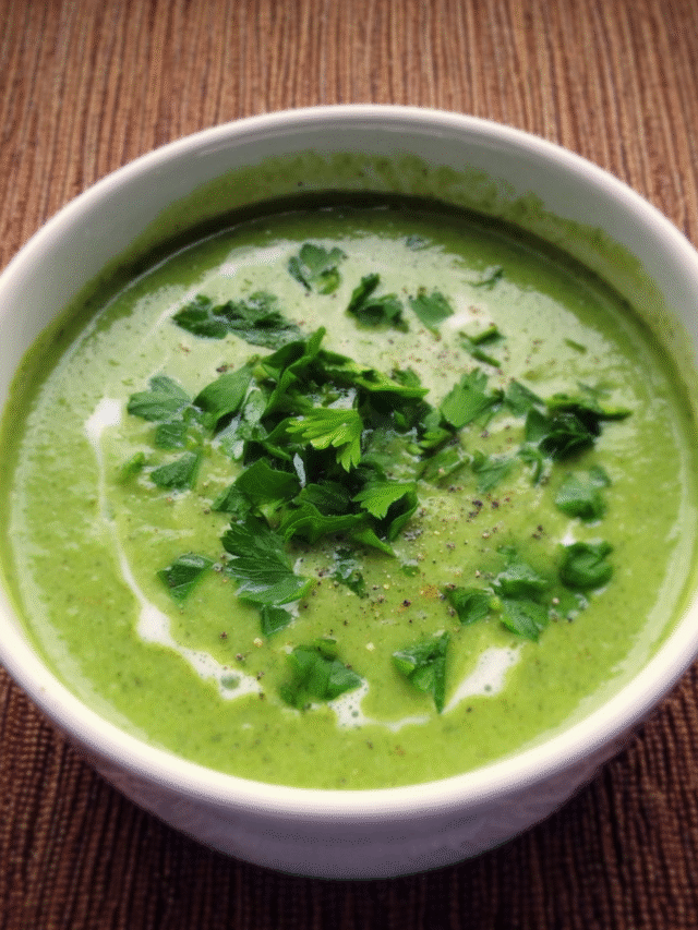 Green Detox Soup in a bowl with fresh herbs