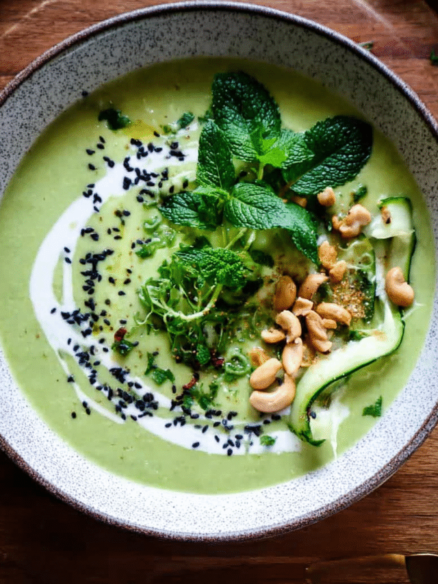 Creamy green vegetable soup with fresh herbs