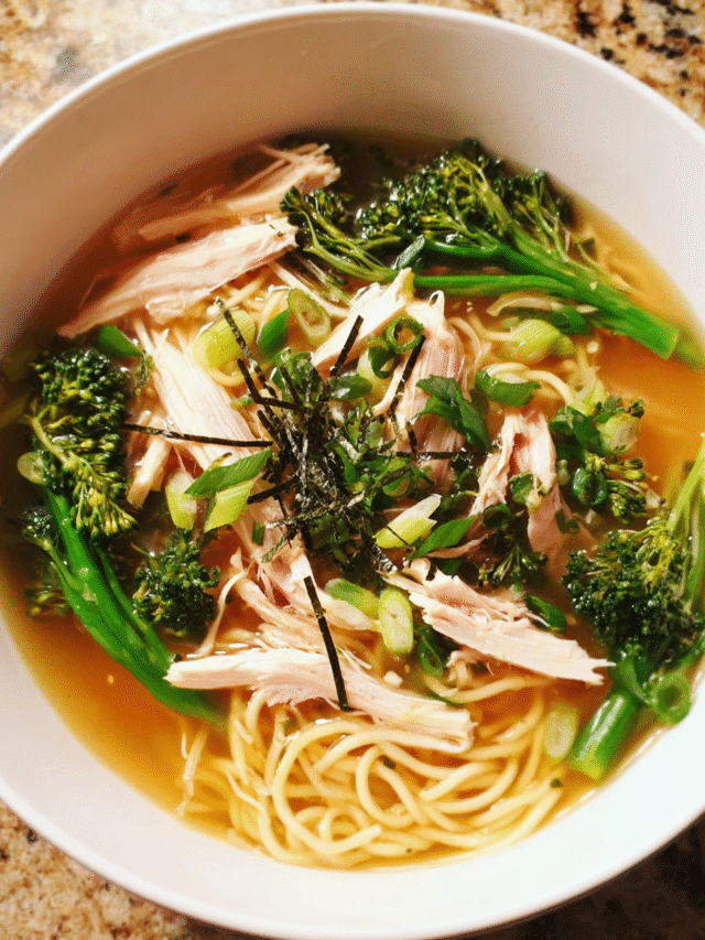 Bowl of Miso Ginger Chicken Soup with noodles, broccolini, and mushrooms