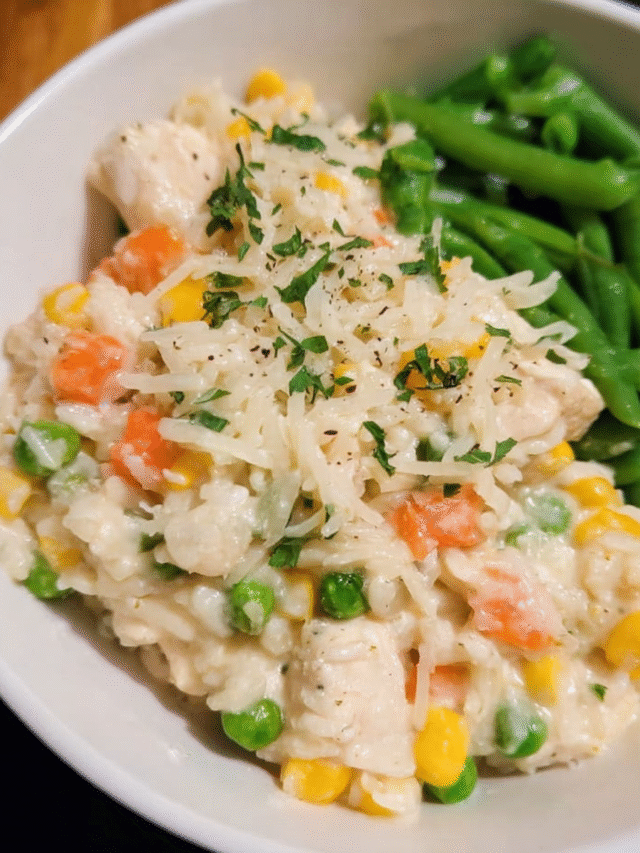 creamy one-pot chicken alfredo rice in skillet