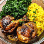 Chicken adobo meal prep bowl with yellow jasmine rice and garlic kale