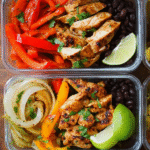Healthy chicken fajitas meal prep bowls with peppers and black beans