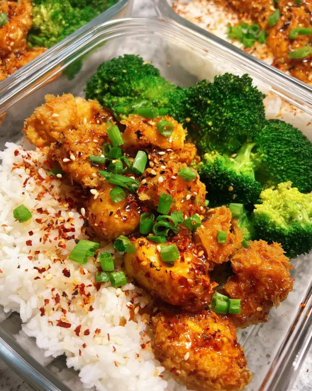 Meal Prep Firecracker Chicken and Rice Bowls with steamed broccoli