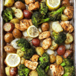 Meal Prep Lemon Pepper Chicken with Potatoes on a sheet pan with broccoli