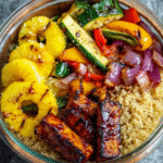 Pineapple BBQ tofu meal prep bowls with grilled vegetables and quinoa