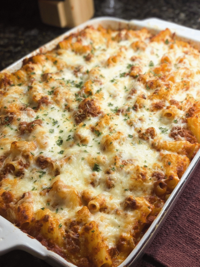 Cheesy make-ahead baked ziti in casserole dish fresh from oven