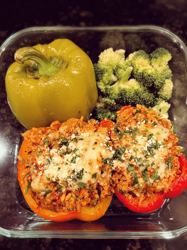 Meal Prep Chorizo Chicken Stuffed Peppers in a glass container with Cotija cheese