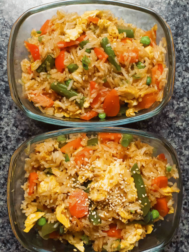 Meal Prep Egg Fried Rice with vegetables and sesame seeds in meal prep containers