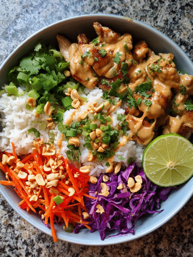 Meal Prep Peanut Chicken and Rice Bowls with Vegetables and Sauce