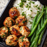 Turkey meatball meal prep with rice and green beans in containers