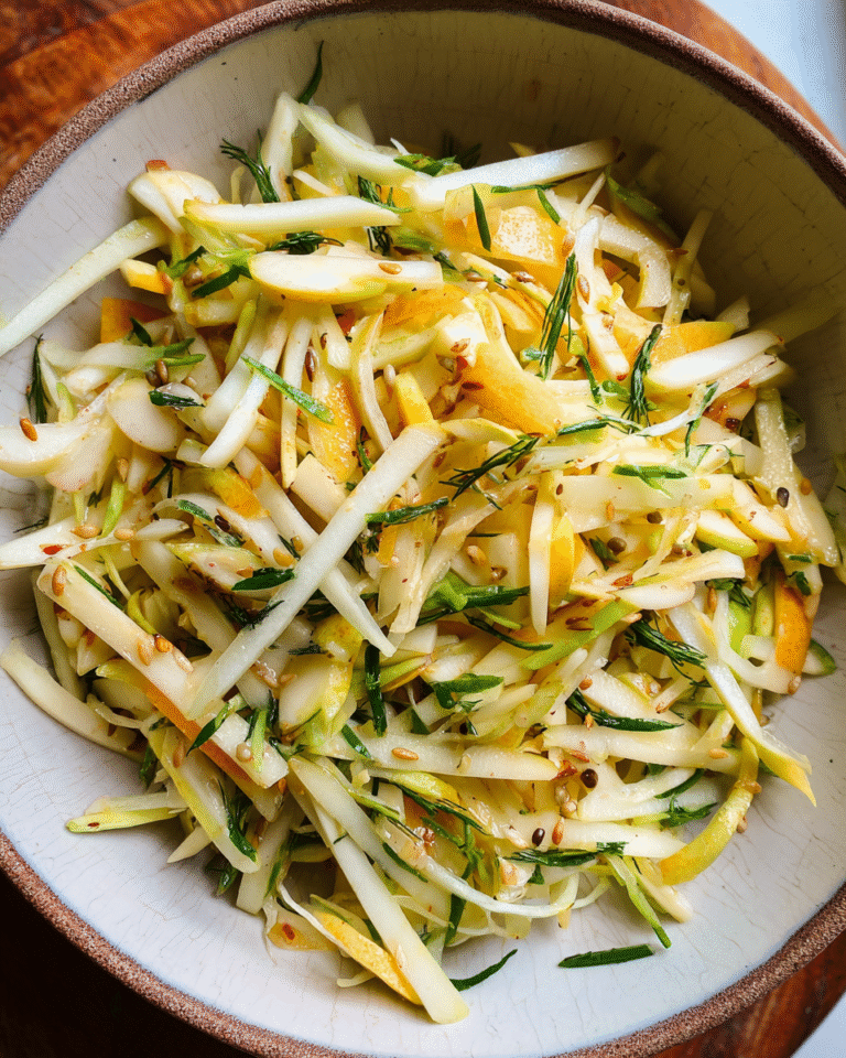 Crispy Apple Kohlrabi Salad with lemon zest and sunflower seeds