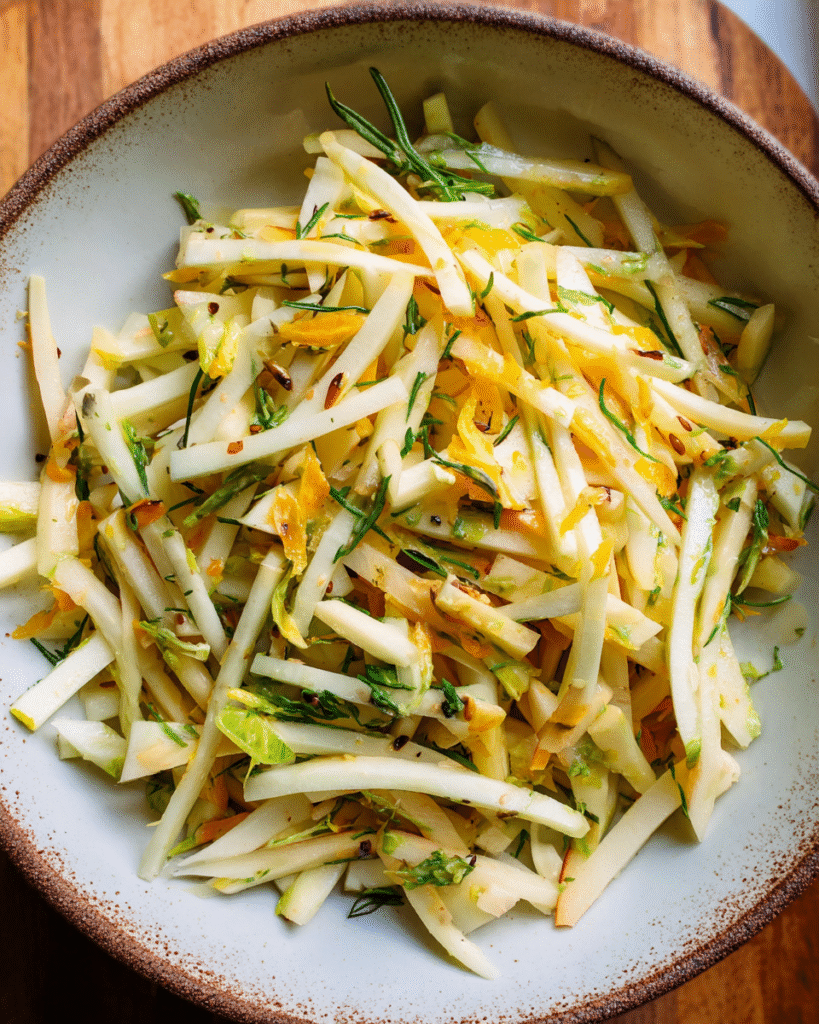 Crispy Apple Kohlrabi Salad with lemon zest and sunflower seeds