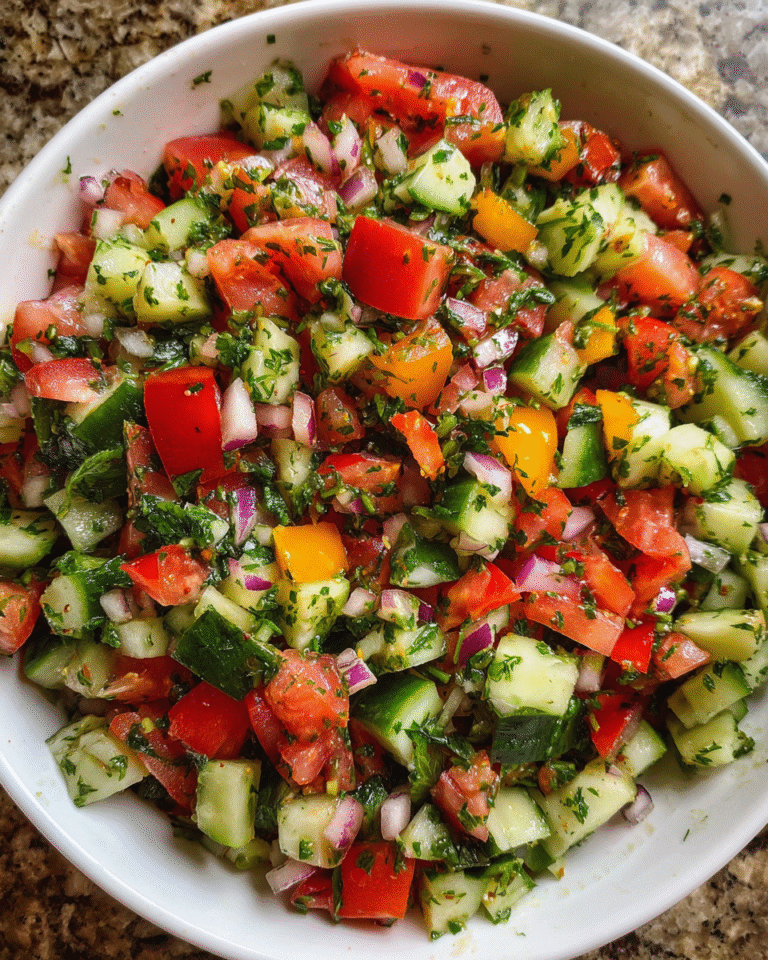 Shirazi Salad Recipe with cucumber, tomato, and fresh herbs in a bowl