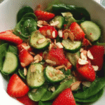 Strawberry Cucumber Spinach Salad in a large serving bowl