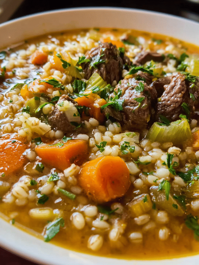 Hearty beef and barley soup with carrots and parsley