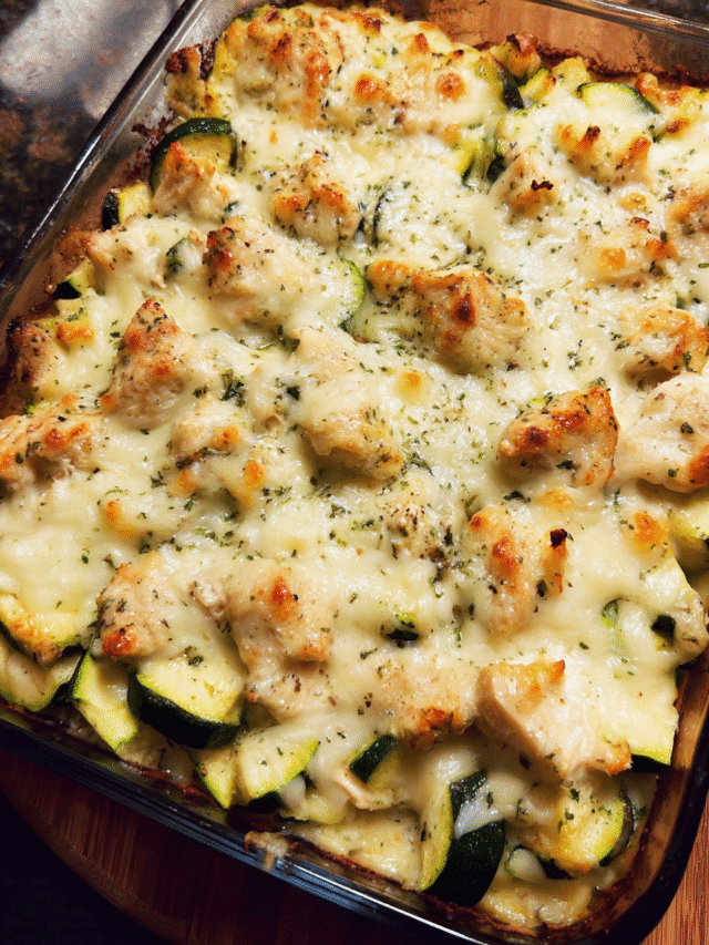 Creamy chicken with zucchini baked casserole with melted mozzarella