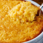 Creamy Corn Casserole baked in a 9x13 dish with golden top