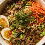 Crockpot beef ramen with noodles, vegetables, and savory broth