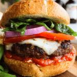 Easy grilled pizza burger with melted mozzarella and basil