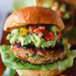 Guacamole turkey burgers with fresh avocado topping