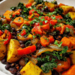 Quick vegetable hash skillet dinner with potatoes, black beans, kale and peppers