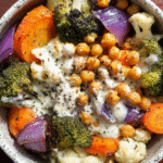 Roasted veggie bowl with chickpeas and lemon tahini sauce