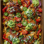 Sheet pan nacho chicken with roasted peppers corn and cotija cheese